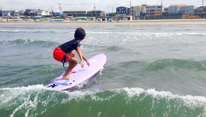 Surfing with family in early morning.1