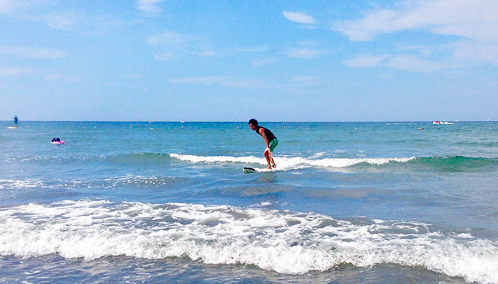 Surfing with family in early morning.2